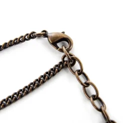 Q-pot. Parlor Jack-o’-lantern Macaron Necklace